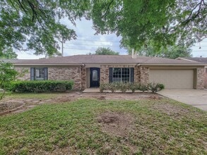 Building Photo - Welcome to your dream rental! This meticulously remodeled 3-bedroom, 2-bathroom home in the heart...