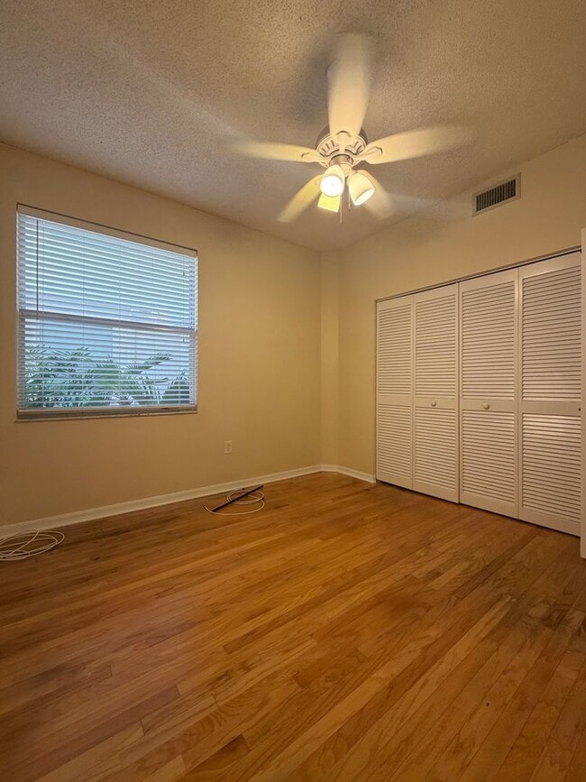 Building Photo - First floor condo in gated East Lake Woodlands of Oldsmar with one car garage