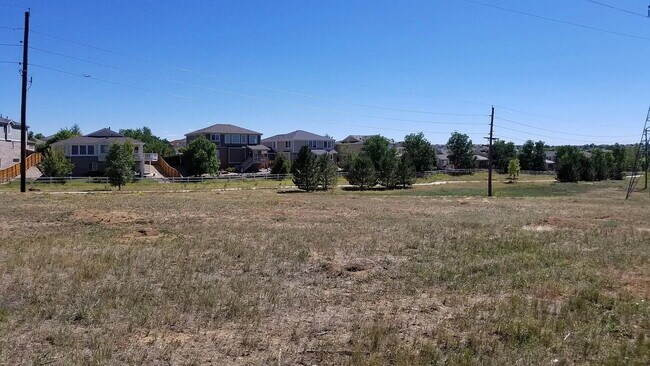 Building Photo - Charming 3-Bed, 2-Bath Home for Rent in Aurora – Backs to Open Space!