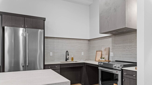 Building Photo - BRAND NEW LUXURY ROW END TOWNHOUSE W 2 CAR GARAGE