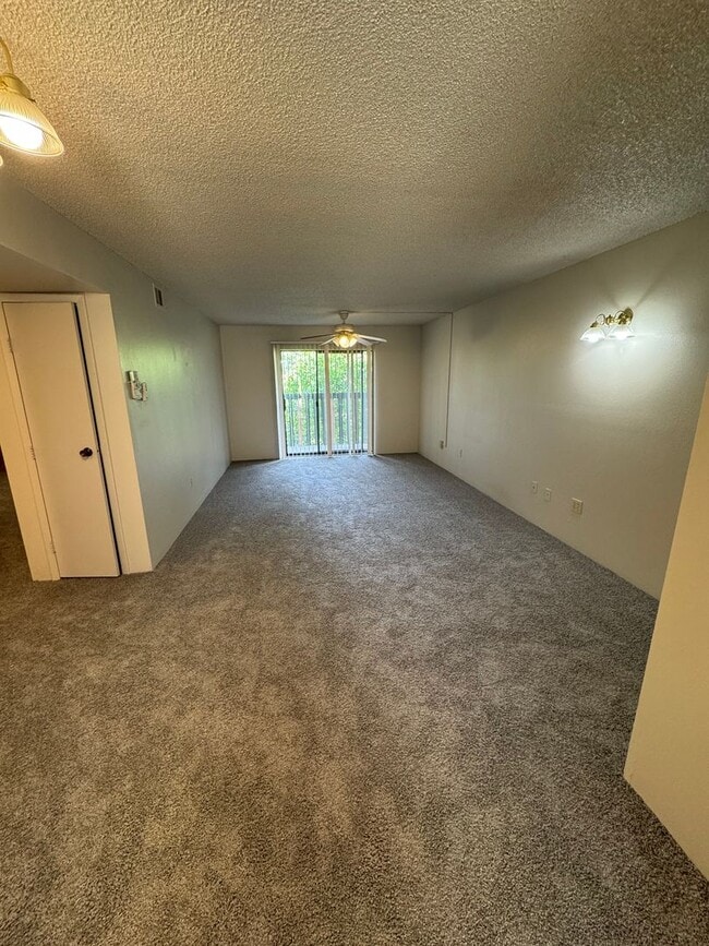 Building Photo - Spacious 2-Bedroom, 1.5-Bath Condo in Bear...