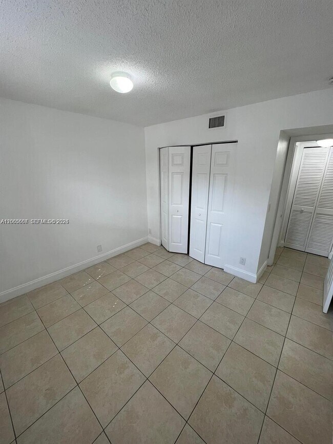 Building Photo - 2421 NW 56th Ave