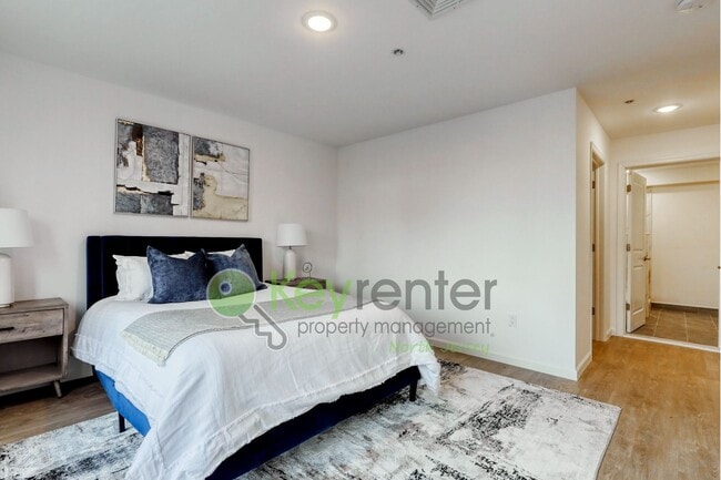 Building Photo - Modern New Construction 2 Bedroom Townhome with Garage & Driveway — First Occupancy!