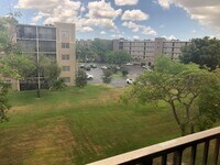 Building Photo - 8550 N Sherman Cir