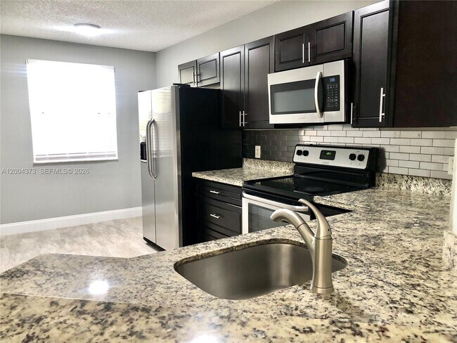 Building Photo - 8761 Wiles Rd