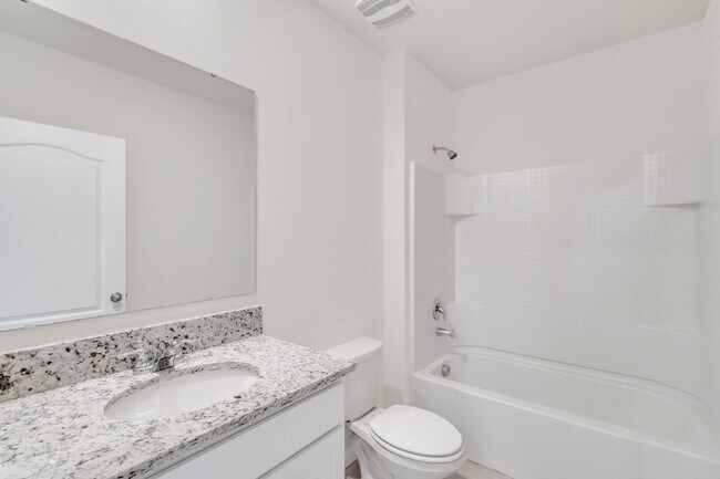 Building Photo - 4 bedrooms and 2 bathrooms, the spacious 1,828 sq ft home features an open concept with a 2 car g...