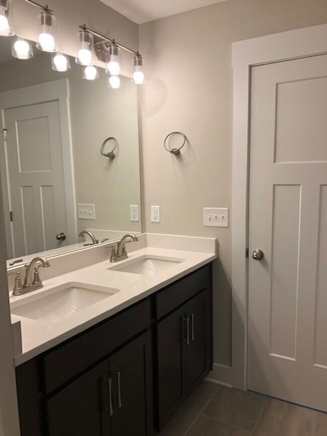 Building Photo - Brand New END UNIT North of Main St  3 miles from Downtown Greenville and I-385.