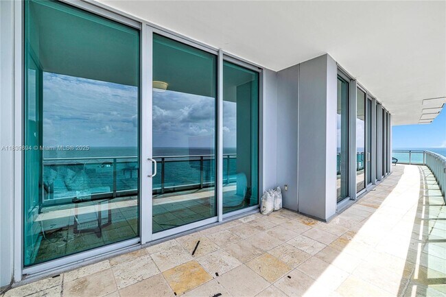 Building Photo - 10295 Collins Ave
