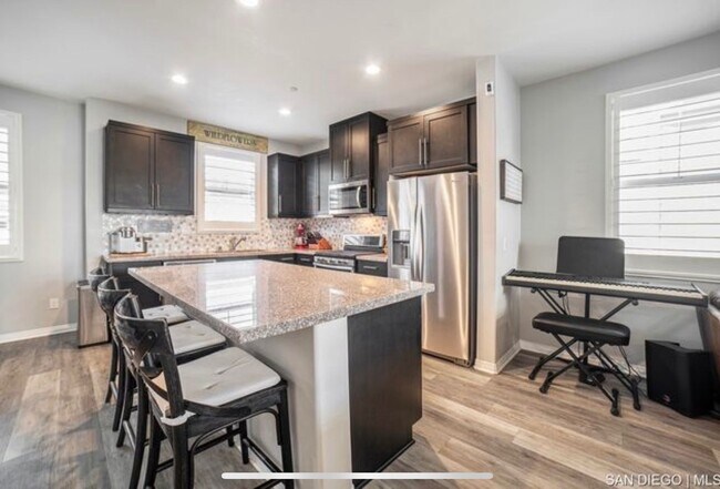 Building Photo - Available Now! Beautifully updated 3-story...