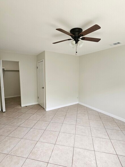 Large dedroom with walk in Closet. - 1735 S Washington Ave