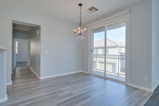 Building Photo - NW!! Gated!! Community Pool/Spa  Recreation Room!! New Paint!! New Flooring!!  Balcony!!  2 car g...