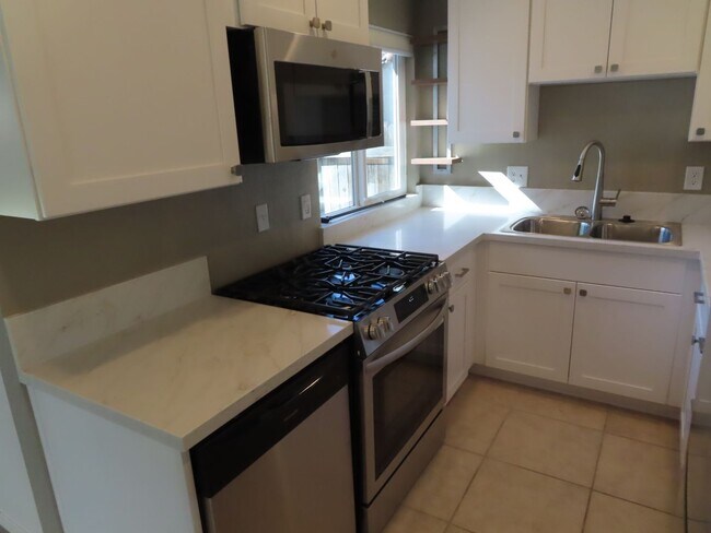 Building Photo - Renovated Three Bedroom Home