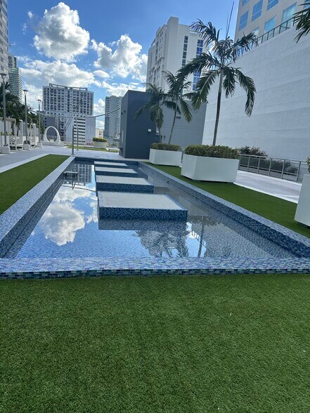 Sitting pool - 690 SW 1st Ct