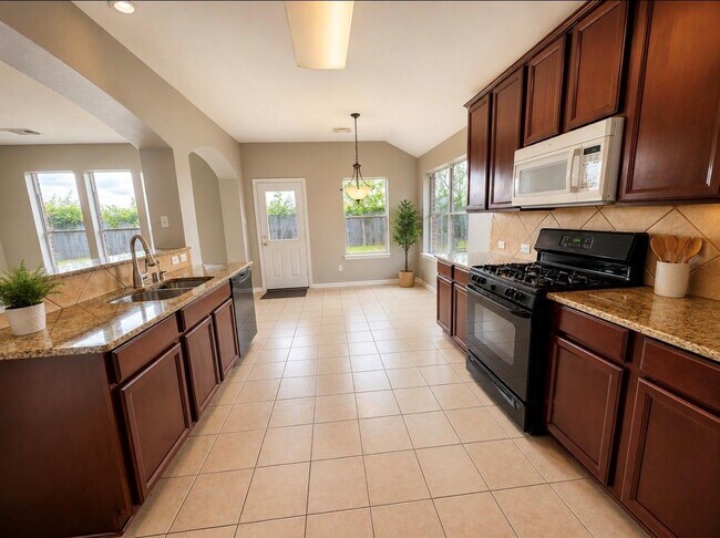 Building Photo - Hollyhock Drive, Stafford, TX 77477 - 4 BR 2 BA single-family home