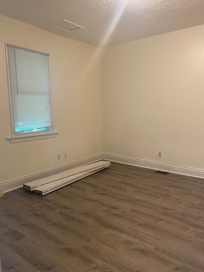 Building Photo - Updated three bedroom two bathroom home in...