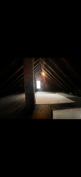 Plenty of in unit attic storage - 2027 Chesterland Ave