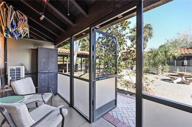 Building Photo - 25000 Tamiami Trl E
