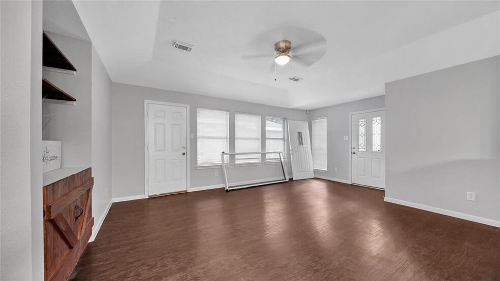 Living Area with updated easy to maintain flooring. - 5023 Deer Point Dr