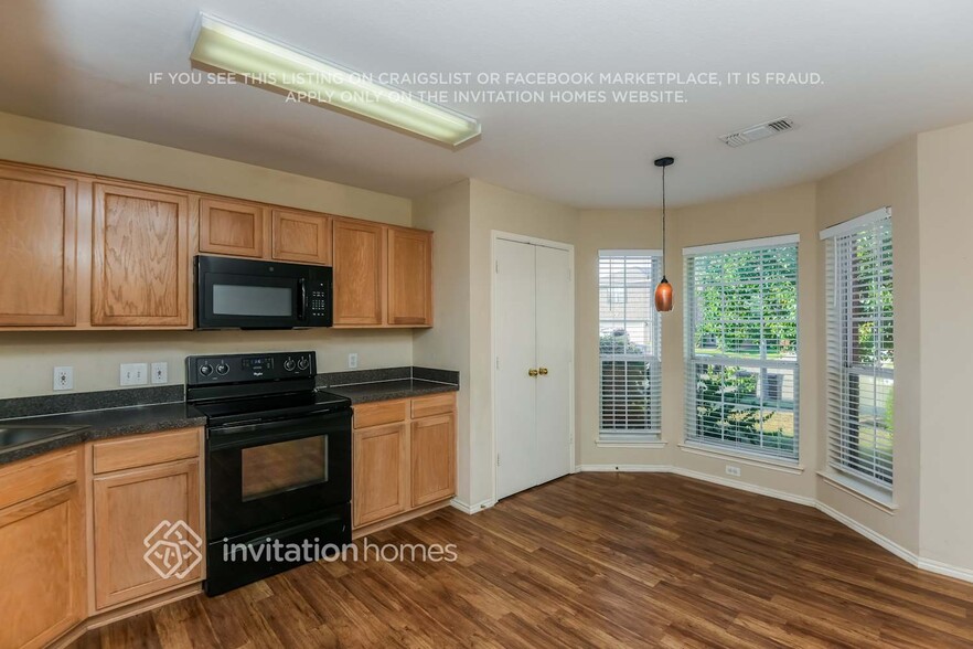 Building Photo - 9055 Rushing River Dr