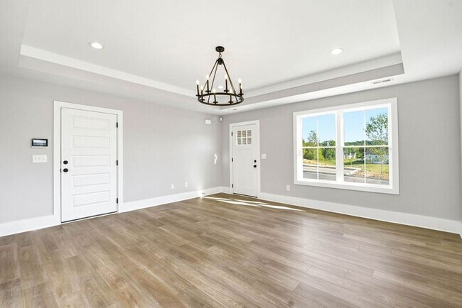 Building Photo - One-Level Living with Private Garage, Feels Like Home, Not an Apartment