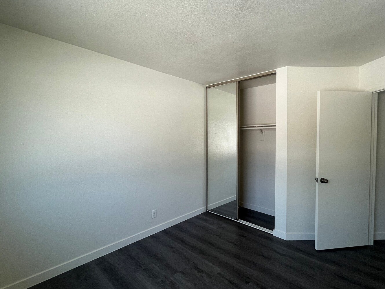 Bedroom 3 with large mirrored sliding door closet - 1103 W Francis St