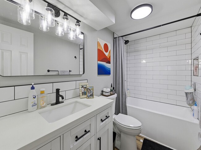 Building Photo - Bright Ranch Home with 2-Car Garage, Finished Basement, and Spacious Yard