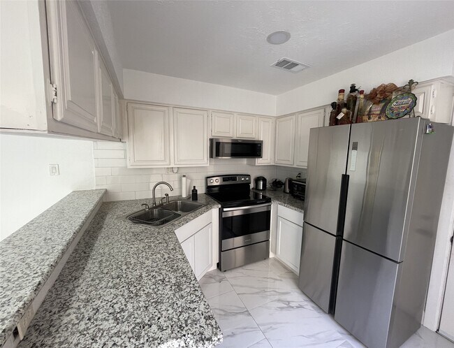 Building Photo - 12255 W Village Dr