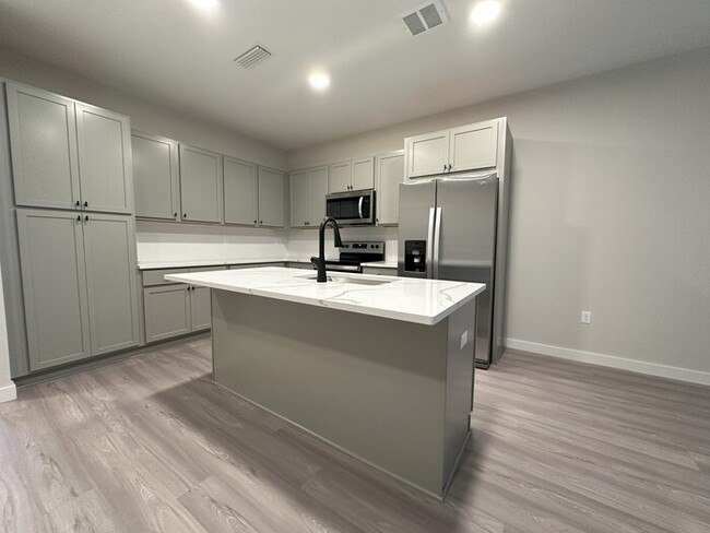 Building Photo - Affordable Luxury Townhome Rental New Cons...