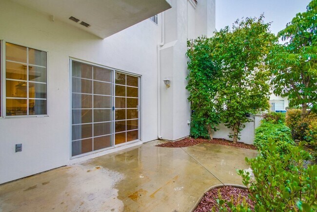 Building Photo - Spacious Townhome in San Marcos, 2-Car Garage, and a Tropical Community Pool!!