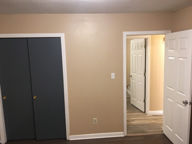 Bedrooms are roomy and have good-sized closets with fresh paint throughout - 510 Short St