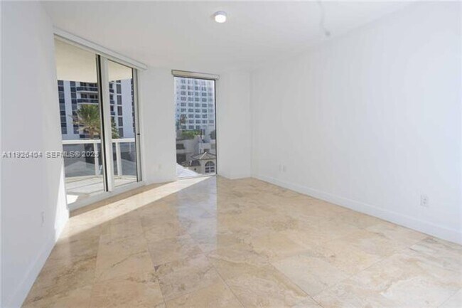 Building Photo - 4779 Collins Ave