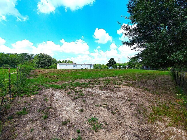 Building Photo - Spacious 4 bedroom with 3 FULL bathrooms nestled on 2 acres! MUST SEE!!!