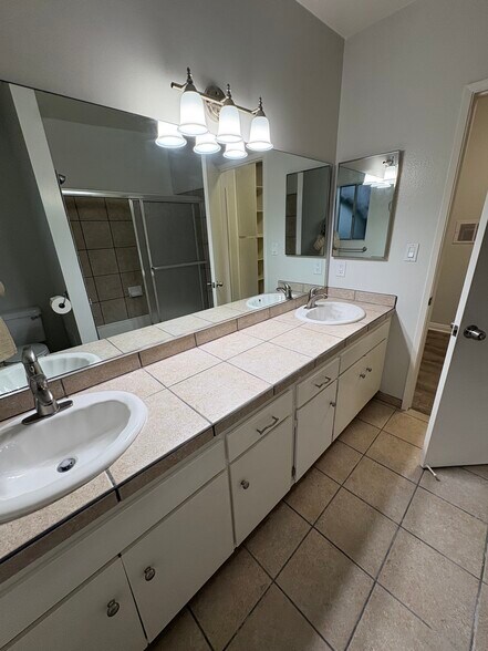 Double sinks in bathroom with lots of storage - 3322 Helms Ave