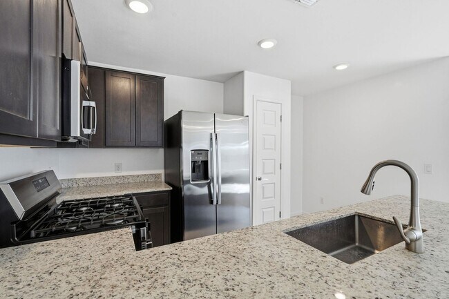 Building Photo - Modern Comfort Meets Desert Serenity – 4 Bed Rocking K Rental Home Available Now!