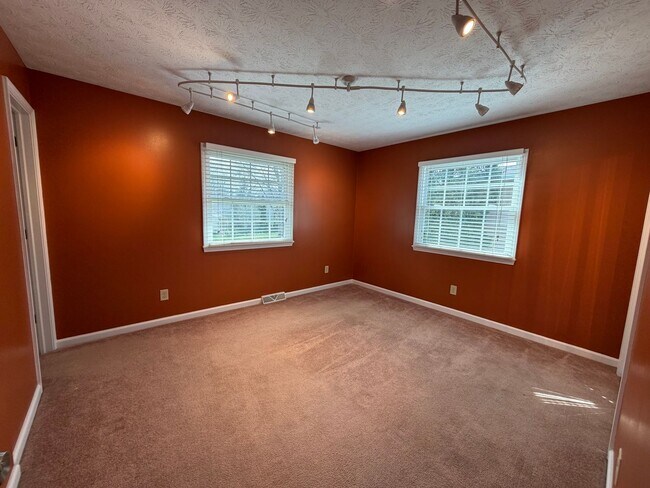 Building Photo - Goodyear Heights Gem with Fireplace, Attached Garage & Massive Backyard