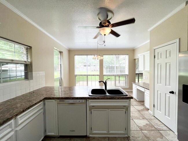 Building Photo - Available NOW!!!! This beautiful 2 story, 4 bedroom, 2 bath, two car garage with garage door open...