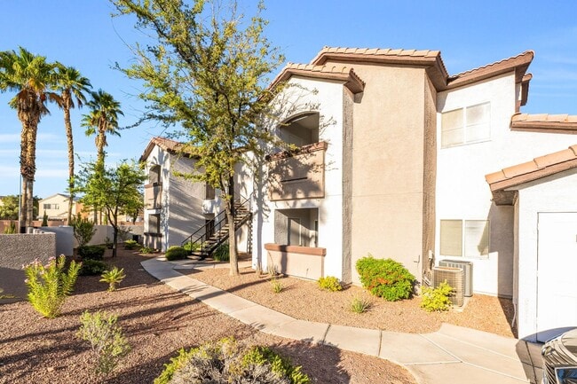 Building Photo - Modern Gated Condo with Upgraded Interior and Attached Garage in Prime South Las Vegas Location!
