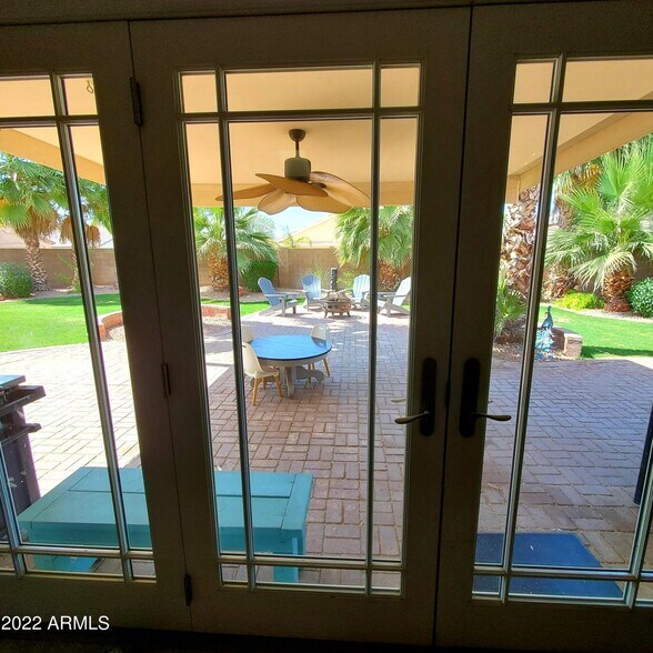 View out the triple patio doors. Notice the Big shade cover too - 9139 W Davis Rd