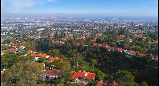 Building Photo - Resort-Style Living with Pool & Iconic Coastal Views