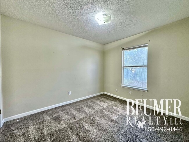 Building Photo - 6 mo Lease Charming Home with Spacious Backyard and Modern Upgrades Near NAS Pensacola