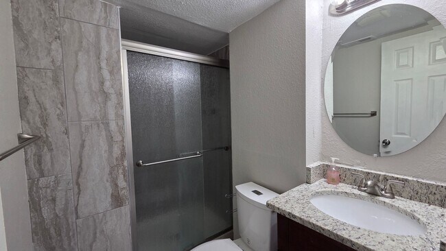 Building Photo - 4 Bedroom 2 Bath with Finished Basement and Study!