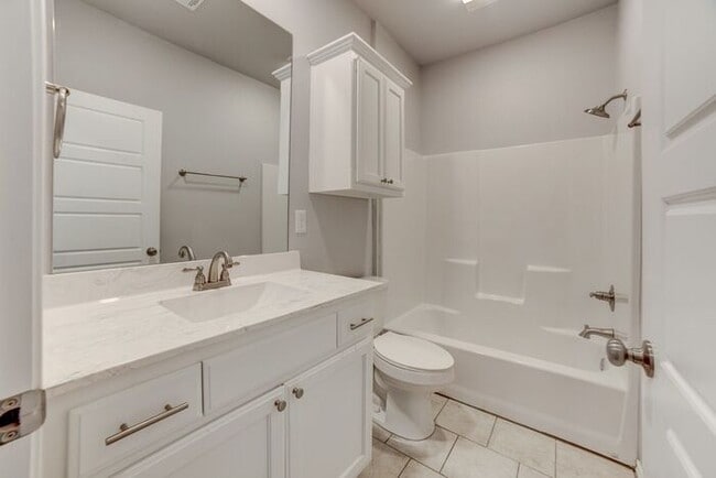 Building Photo - 1/1 Duplex Near TU With Large Fenced Yard!