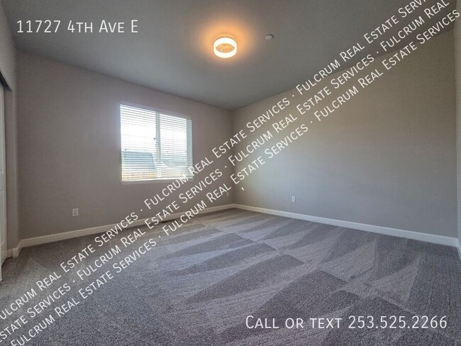 Building Photo - 11727 4th Ave E