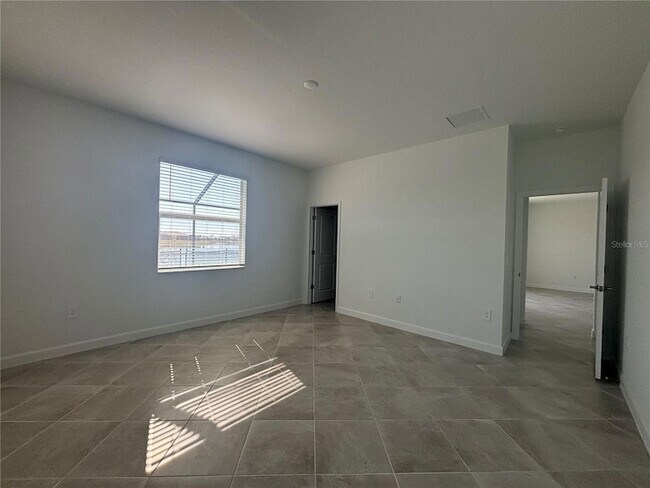 Building Photo - 7869 Lakes Edge Ln