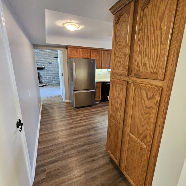 Building Photo - 3 Bedroom, 1.5 Bath Brick Ranch. Huge Great Room and Living Room. Big Kitchen, Backyard with Deck...