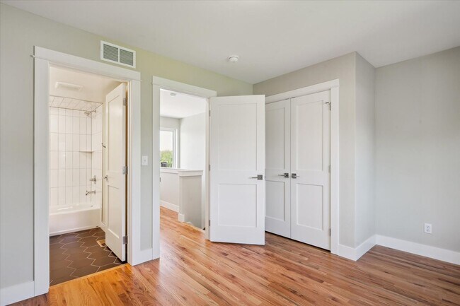 Building Photo - Modern 4-Bedroom Townhome with Rooftop Deck Near Sloan’s Lake & Light Rail