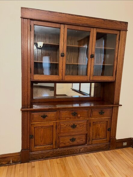 Dining room with a built-in hutch cabinet - 3748 W Lyndale St