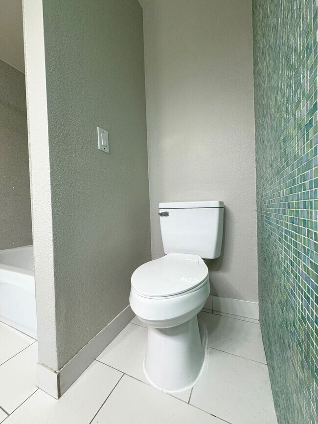 Building Photo - Fully renovated with a contemporary flair ...