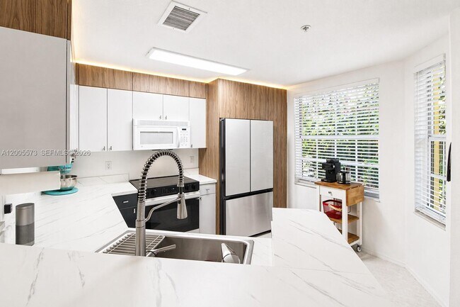 Building Photo - Northeast 8th Avenue, Miami Shores, FL 33138 - 2 BR 2 BA townhouse