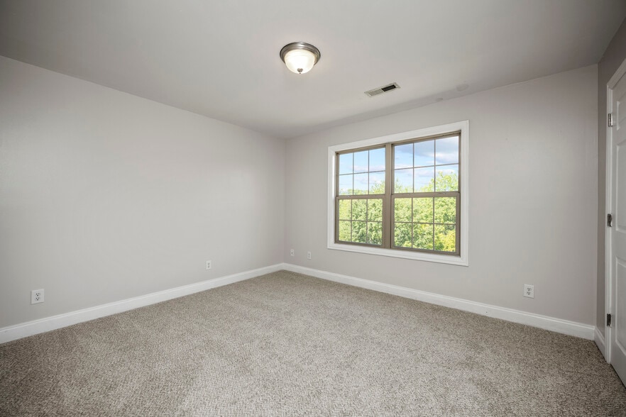 Second Floor - 2 of 3 (12x10) Bedrooms overlooking beautiful Greenspaces, Tree line and back yard. - 393 Hays Blvd